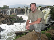 Thika, Kenya Expedition - Greg at Fourteen Falls for a refeshing break.