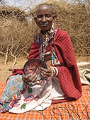Thika, Kenya Expedition - Maasai woman holding bowl I purchased.